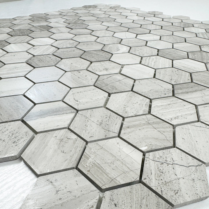 Hexagonal stone tiles with a gray and white pattern on a light background, Grey Marble Mosaic Tile