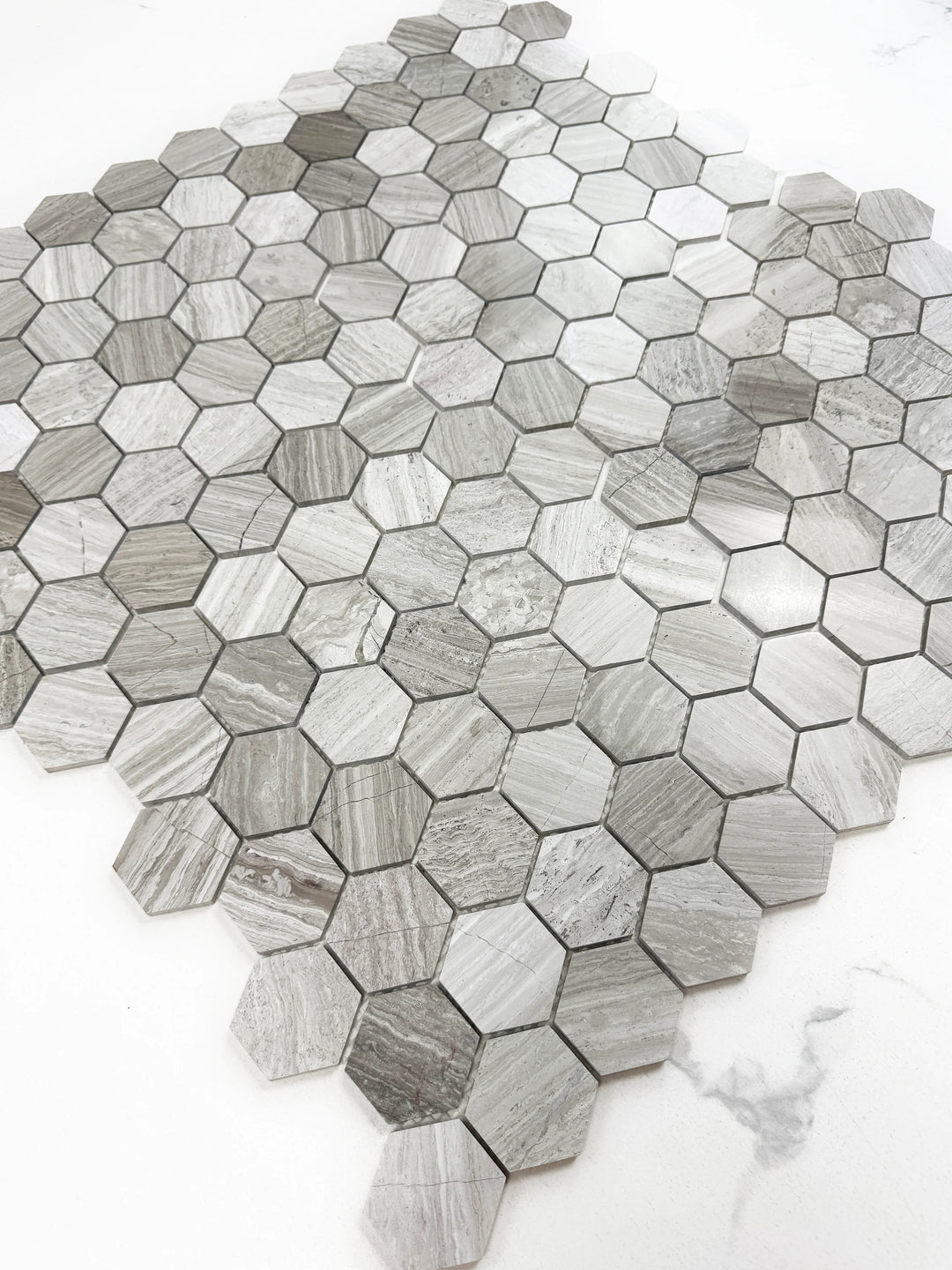 Hexagonal mosaic tile pattern on a white background, Grey Hexagon Marble Mosaic Tile