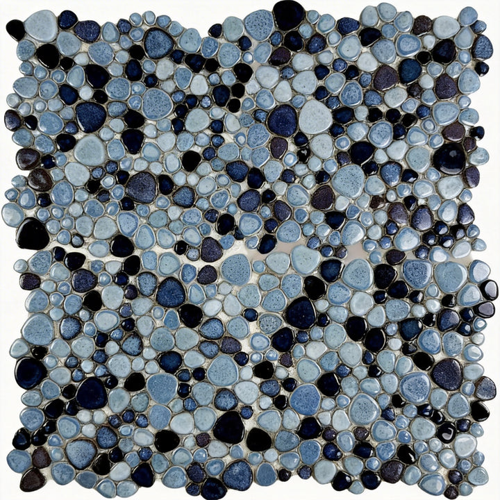 Mosaic pattern of blue and black pebbles